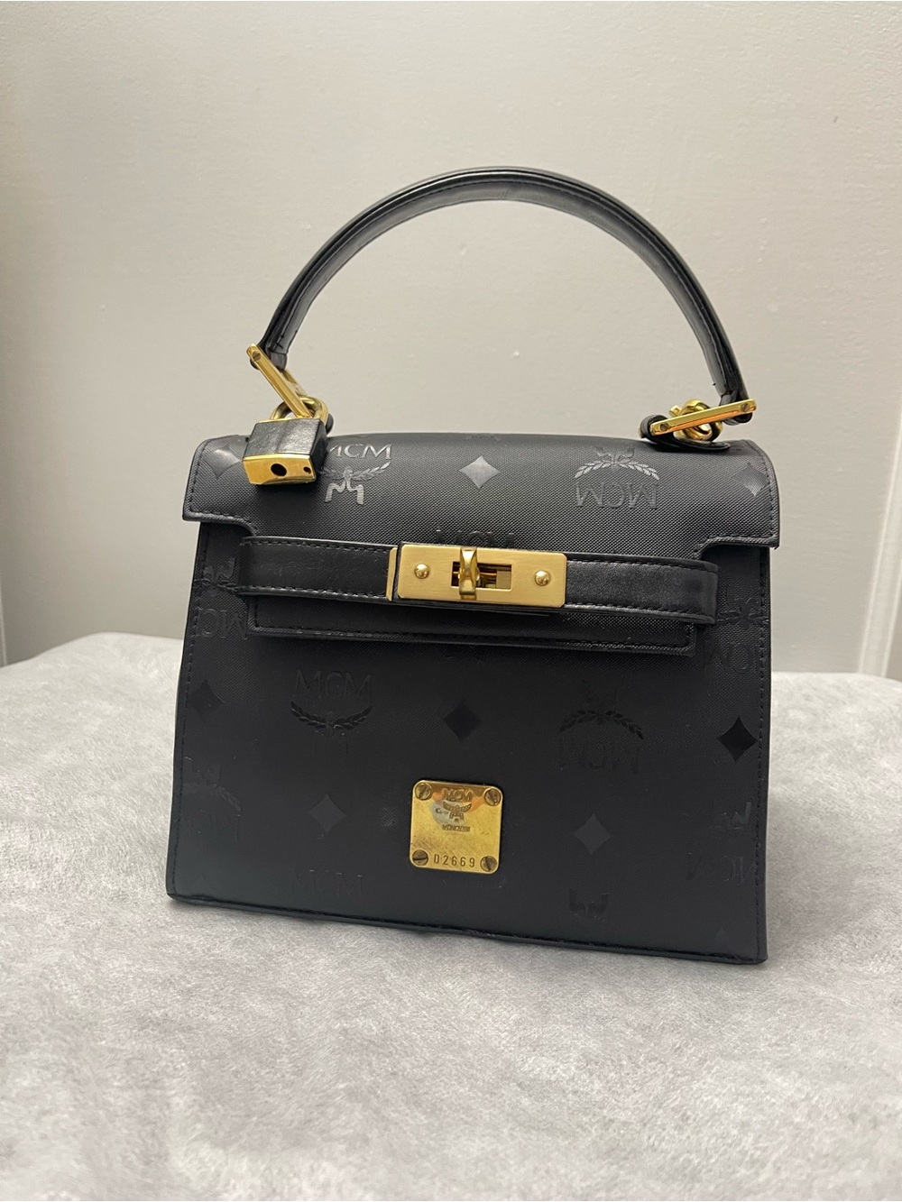 MCM Black Leather Top-Handle Satchel with Gold Hardware